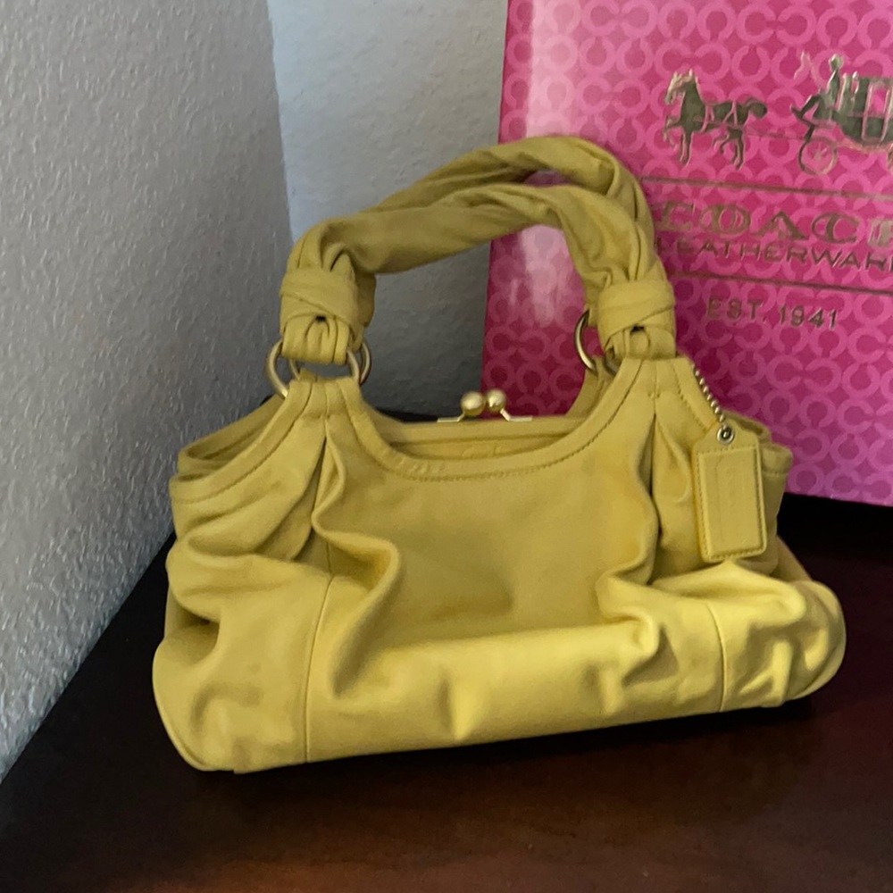 Vintage yellow coach bags with kiss lock